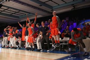 Syracuse's bench celebrates during the Battle 4 Atlantis tournament. SU won three games in three days.