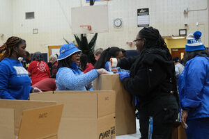 Volunteers from various Syracuse-based organizations, including city Greek life and Micron Technology, packed boxes of clothing and food donations. The donations were later delivered to non-profits and community-based organizations around the city.